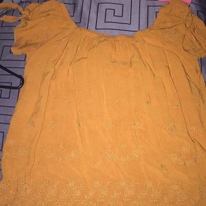 off the shoulder shirt with details